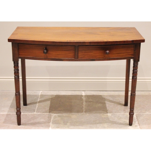 741 - A 19th century mahogany bow front console table, with two equal short drawers, one lockable with key... 