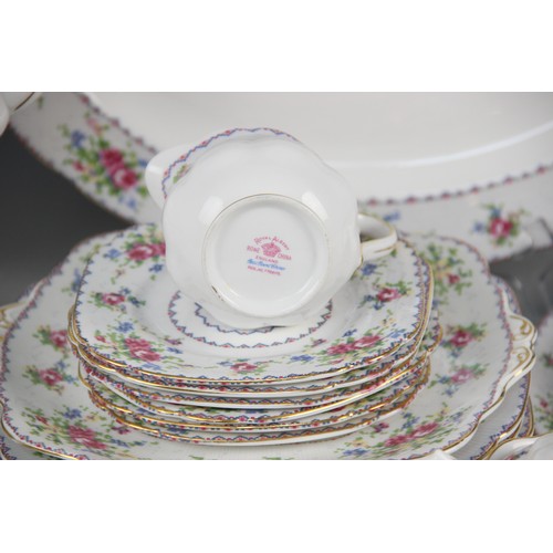 411 - A Royal Albert Petite Point part service, comprising eight dinner plates, 24.5cm wide, six dessert p... 