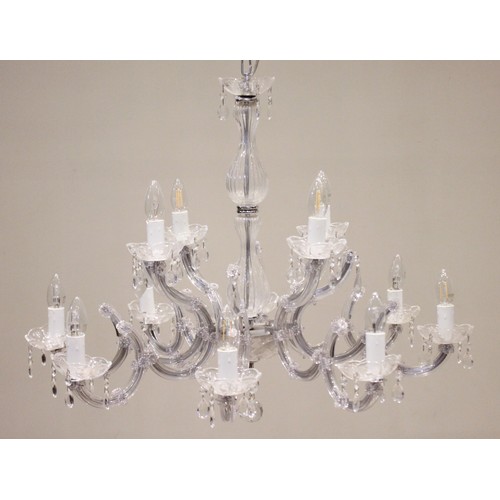 606 - A French style eight branch chandelier, late 20th century, the glass twin baluster stem extending to... 