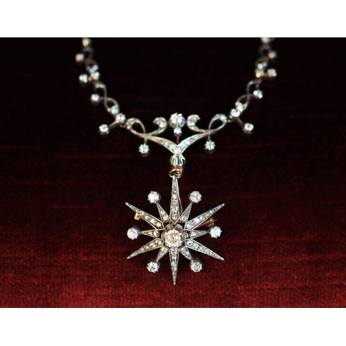 97 - A Victorian diamond necklace, designed as a diamond set starburst brooch pendant, with central old c... 