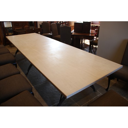 789 - A contemporary limestone topped dining table, of very large proportions, late 20th century, the lime... 