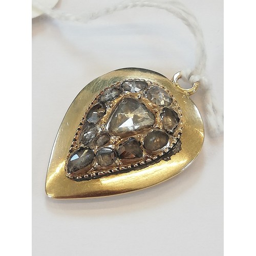 98 - An 18th century diamond set heart-shaped pendant, the central cluster set with rose-cut diamonds, th... 