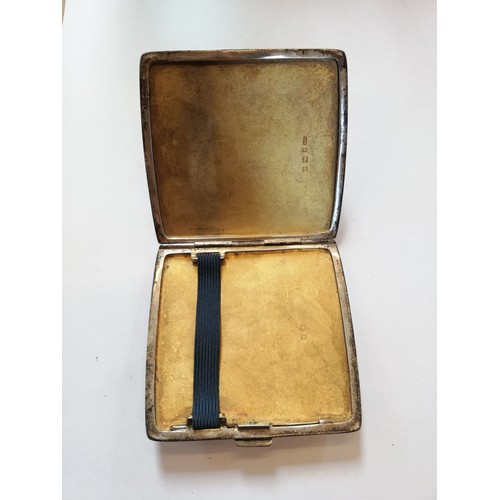 36 - An Art Deco silver cigarette case by Deakin & Francis, Birmingham 1932, of rounded rectangular form ... 