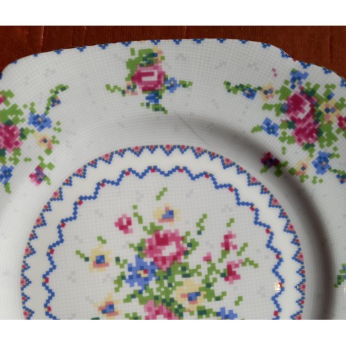 411 - A Royal Albert Petite Point part service, comprising eight dinner plates, 24.5cm wide, six dessert p... 