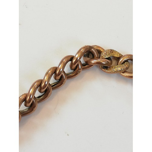 127 - A 9ct gold curb-link bracelet, designed as alternating plain polished and patterned links, 18cm long... 