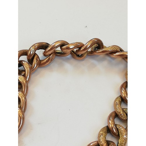 127 - A 9ct gold curb-link bracelet, designed as alternating plain polished and patterned links, 18cm long... 