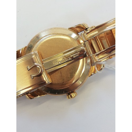 80 - An 18ct gold Omega Automatic Seamaster wristwatch, circa 1960, the champagne dial with gold toned Ar... 