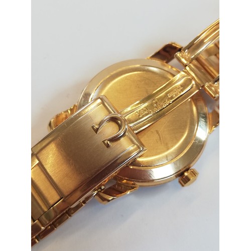 80 - An 18ct gold Omega Automatic Seamaster wristwatch, circa 1960, the champagne dial with gold toned Ar... 