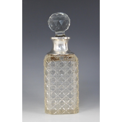 64 - An Edwardian silver mounted clear glass decanter, S Blanckensee & Son Ltd, Chester 1909, the square ... 