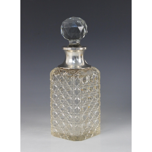 64 - An Edwardian silver mounted clear glass decanter, S Blanckensee & Son Ltd, Chester 1909, the square ... 