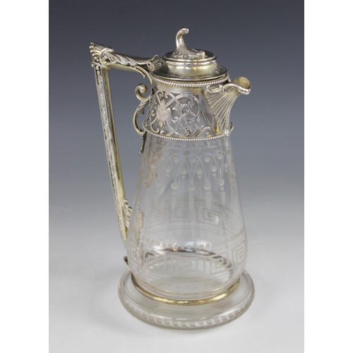 65 - A Victorian silver mounted glass decanter, Gough & Silvester, Birmingham 1865, tapering body etched ... 