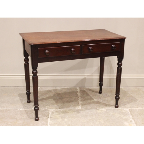 676 - A Victorian mahogany side table, the rectangular moulded top with two frieze drawers, raised upon tu... 