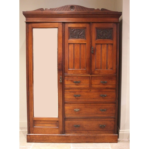 680 - A late Victorian walnut gentleman’s compactum wardrobe in the manner of Lamb Manchester, designed wi... 