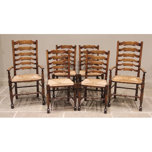 695 - A set of six reproduction oak ladder back dining chairs, in the manner of Titchmarsh and Goodwin, la... 