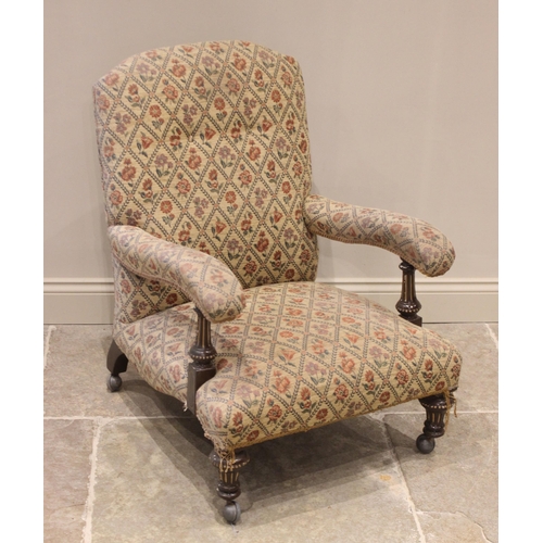 701 - A Victorian drawing room chair, the button back extending to down swept padded arms raised upon pain... 