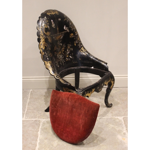 702 - A Victorian papier mache side chair, the arched back with a back swept scalloped rim, applied with g... 