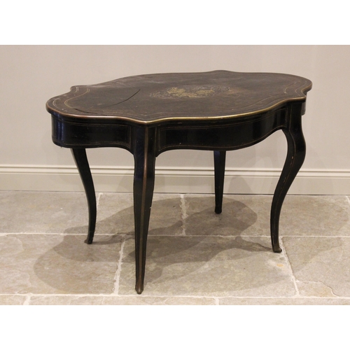 703 - A late 19th century ebonised and brass inlaid bureau plat/centre table, the serpentine shaped top ce... 