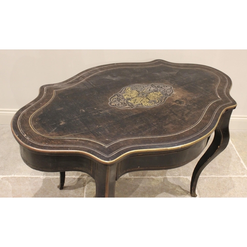 703 - A late 19th century ebonised and brass inlaid bureau plat/centre table, the serpentine shaped top ce... 