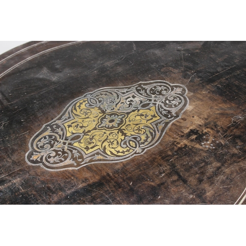 703 - A late 19th century ebonised and brass inlaid bureau plat/centre table, the serpentine shaped top ce... 