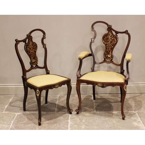 704 - A late Victorian walnut, ivory and boxwood inlaid salon open armchair, the lyre shaped back with a s... 