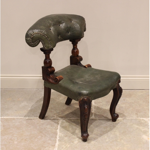 711 - A mid 19th century mahogany and green leather library/sporting chair, the adjustable padded back wit... 