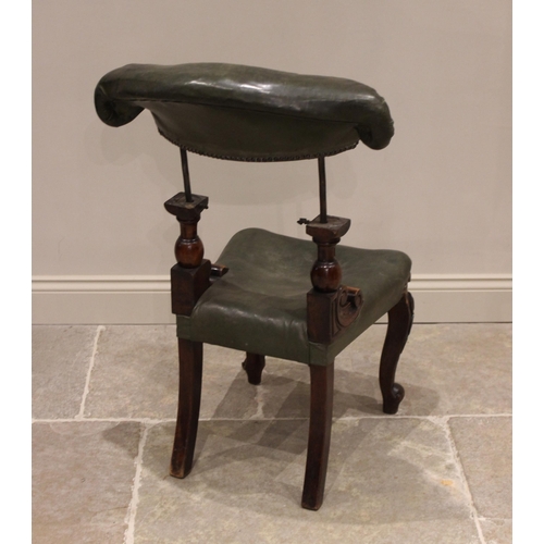 711 - A mid 19th century mahogany and green leather library/sporting chair, the adjustable padded back wit... 