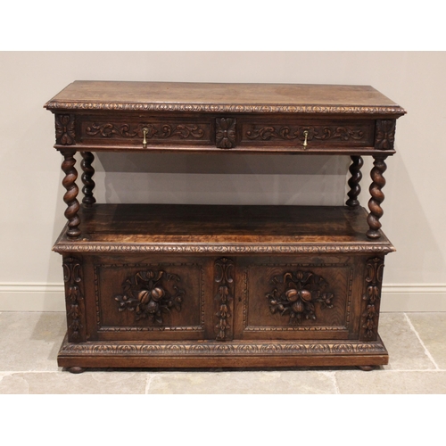 714 - A Victorian carved oak buffet, the upper tier with a pair of foliate carved frieze drawers, raised u... 