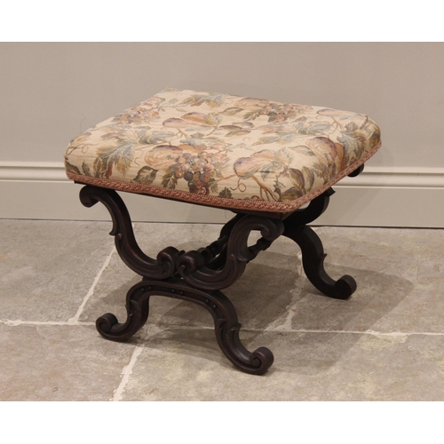 715 - A mid 19th century mahogany and upholstered 'X' frame foot stool, the rectangular seat raised upon a... 