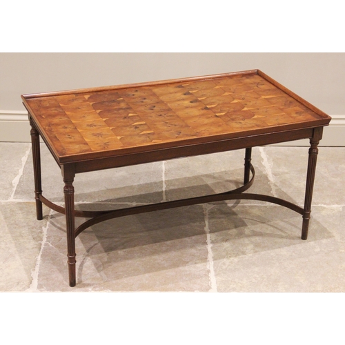 736 - A yew wood oyster veneered coffee table, mid 20th century, the rectangular galleried top inlaid with... 