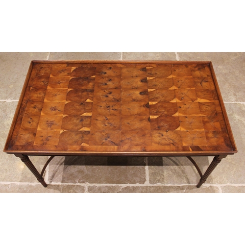 736 - A yew wood oyster veneered coffee table, mid 20th century, the rectangular galleried top inlaid with... 