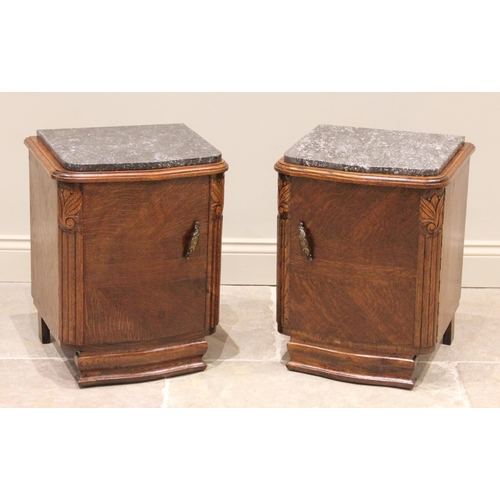 739 - A pair of French style oak marble top bedside cupboards, mid 20th century, each of serpentine form, ... 