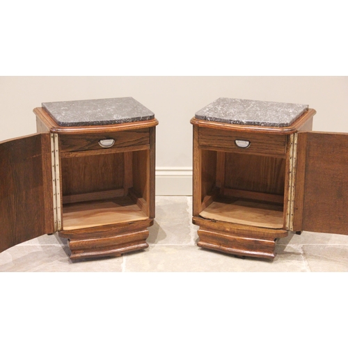 739 - A pair of French style oak marble top bedside cupboards, mid 20th century, each of serpentine form, ... 