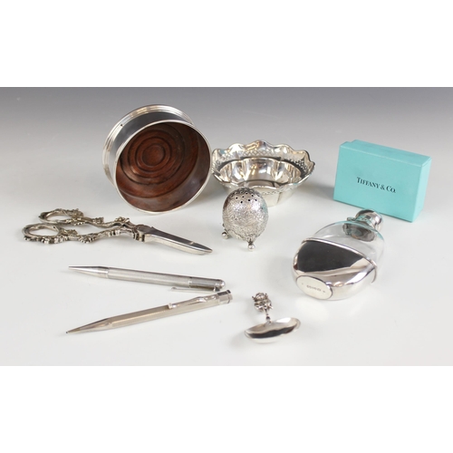 69 - A selection of silver and silver coloured tableware and accessories, to include; a Tiffany silver fl... 