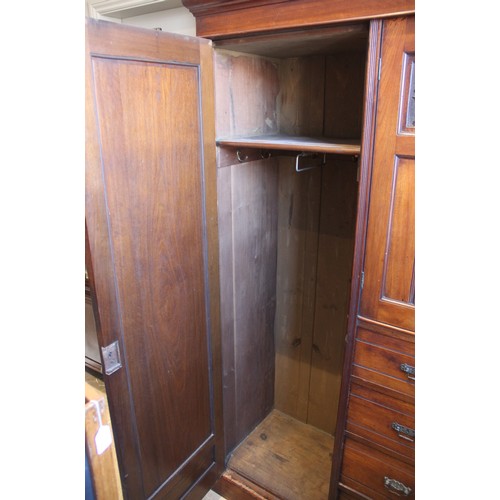 680 - A late Victorian walnut gentleman’s compactum wardrobe in the manner of Lamb Manchester, designed wi... 