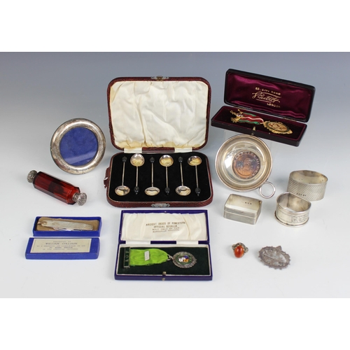 10 - A selection of silver and silver coloured tableware and accessories, to include; a cased set of six ... 