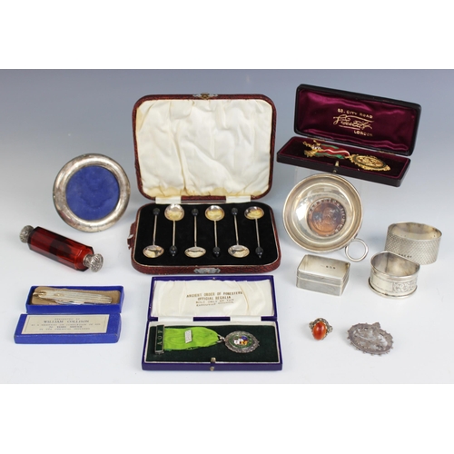 10 - A selection of silver and silver coloured tableware and accessories, to include; a cased set of six ... 