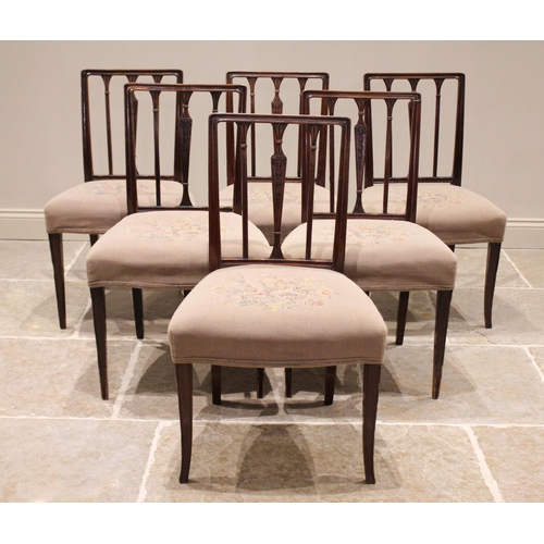 686 - A well matched set of six 19th century Sheraton style mahogany dining chairs, each with a rail back,... 