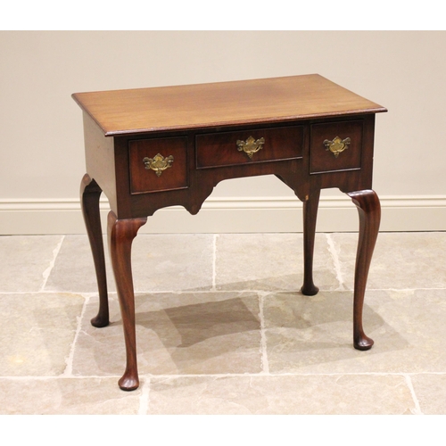 689 - A 19th century mahogany low boy/side table, the rectangular moulded top above three frieze drawers a... 