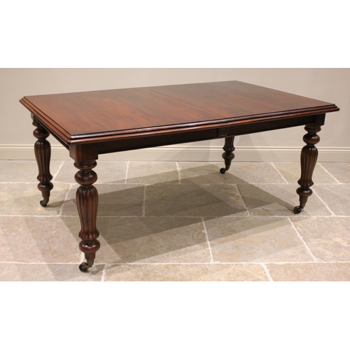 692 - A Victorian style mahogany dining table, late 20th century, the rectangular top with a moulded edge ... 