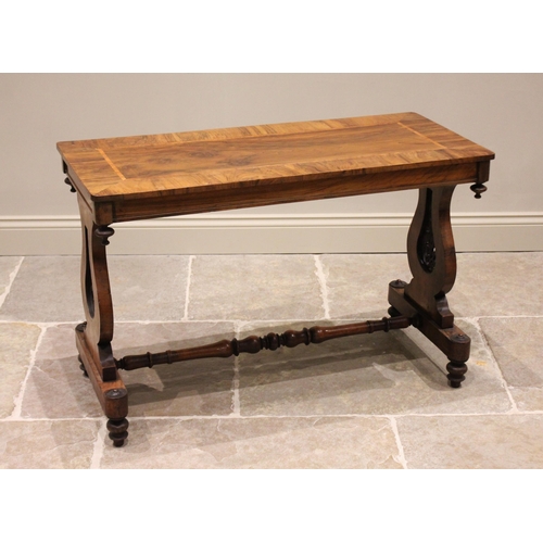 693 - A mid 19th century figured walnut side/occasional table, the rectangular crossbanded top above a pla... 