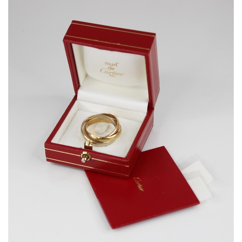 72 - A Les Must de Cartier 18ct gold trinity ring, in rose, yellow and white gold, size P 1/2, weight 9.5... 