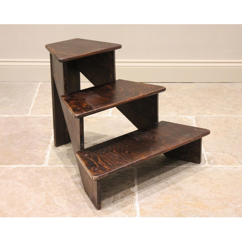 721 - A set of stained wooden library steps, 20th century, of pyramidal form, the three graduated steps ra... 