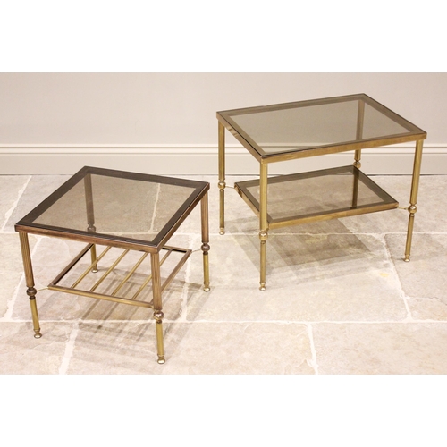 735 - A continental brass and glass topped occasional table, the smoked glass table top raised upon fluted... 