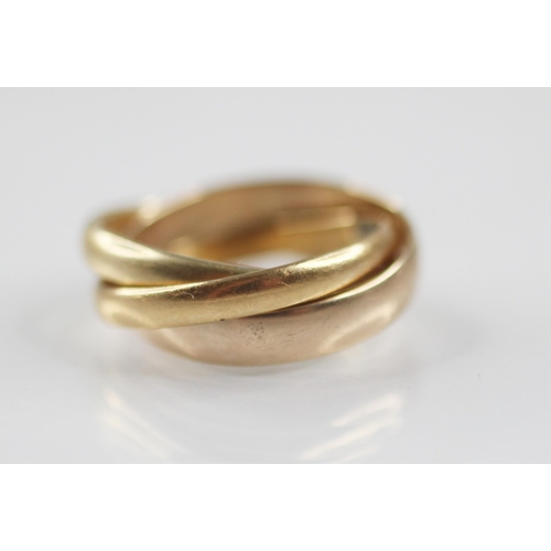 78 - A trinity ring, comprising three interlocking bands, one 18ct gold, marked for Birmingham 1929, one ... 