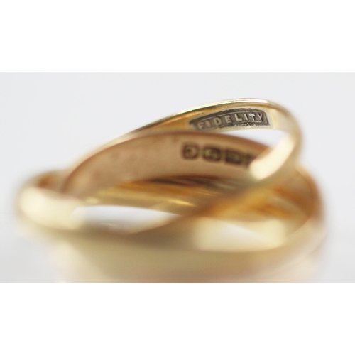 78 - A trinity ring, comprising three interlocking bands, one 18ct gold, marked for Birmingham 1929, one ... 