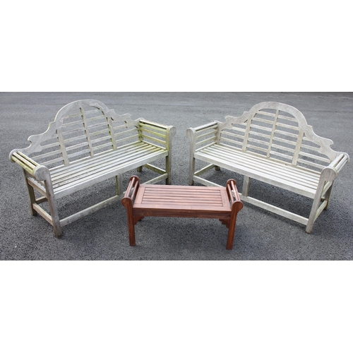 742 - A pair of Lutyens type benches, each with an arched back extending to scrolled arms, raised upon leg... 