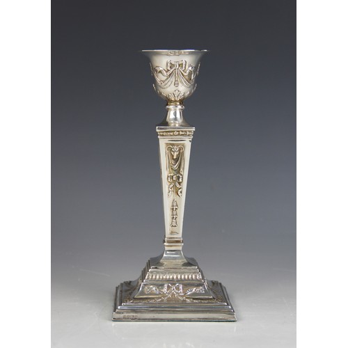25 - An Adam style weighted silver candlestick, Sheffield 1991 (maker's mark worn), urn shaped sconce on ... 
