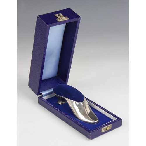 26 - A novelty silver pin cushion, A Marston & Co, Birmingham 1979, modelled as a shoe with blue velvet c... 