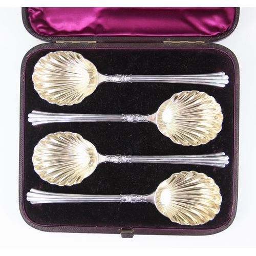 100 - A cased set of four Victorian silver serving spoons, Francis Higgins III, London 1882, each with she... 