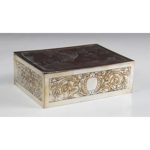 107 - A silver plated jewellery casket, of rectangular form, the cover depicting Wofang Amadeus Mozart pla... 